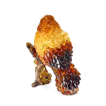 Птичка на ветке с шишкой Янтарь/полистоун купить